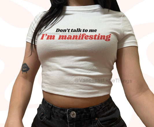 Don't Talk To Me I'm Manifesting Crop Top Baby Tee